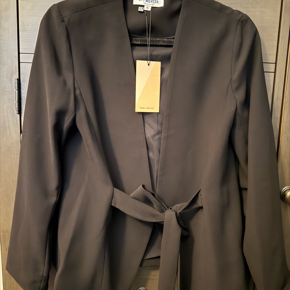 Of / Mercer New YorkBlack Collarless Blazer with Tie Waist and Minimalist Design